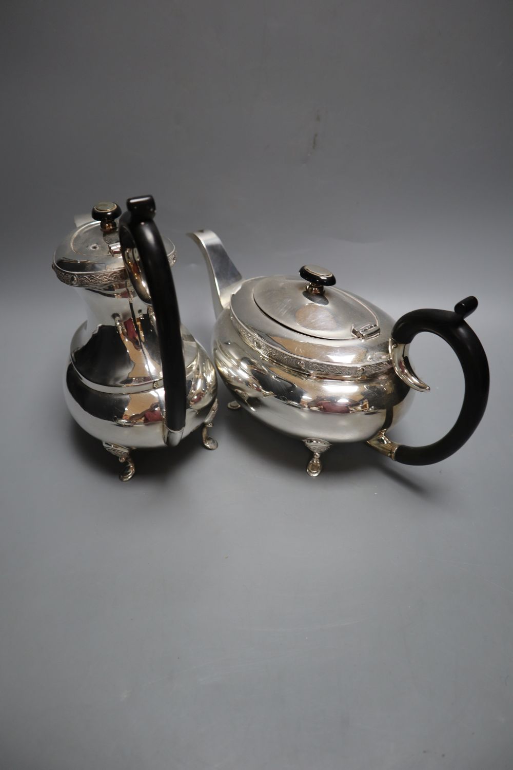 A silver plated four piece tea and coffee service, hot water jug 21cm